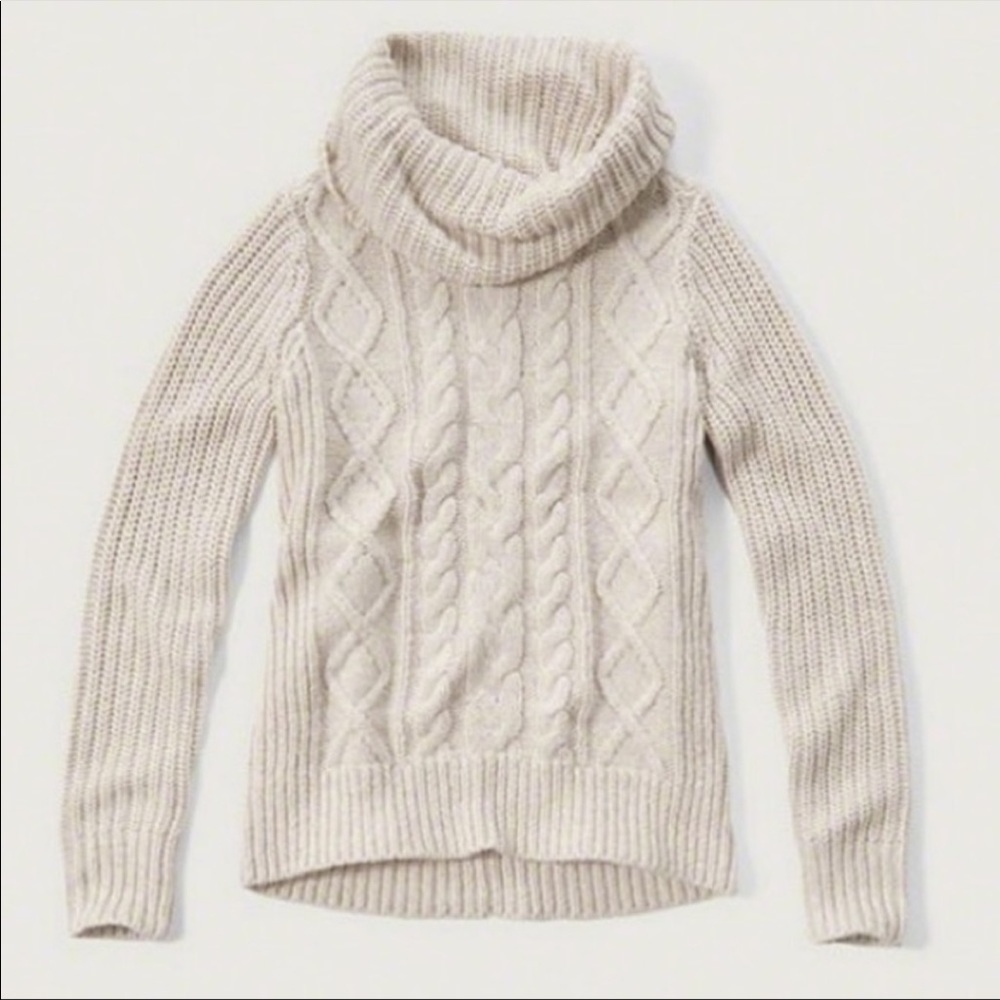 Cable knit turtleneck sweater in Cream